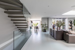 Floating staircase into open living space